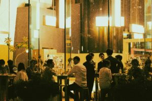 https://unsplash.com/photos/a-group-of-people-sitting-at-a-table-in-a-restaurant-k93D7zgmMBI?utm_content=creditShareLink&utm_medium=referral&utm_source=unsplash